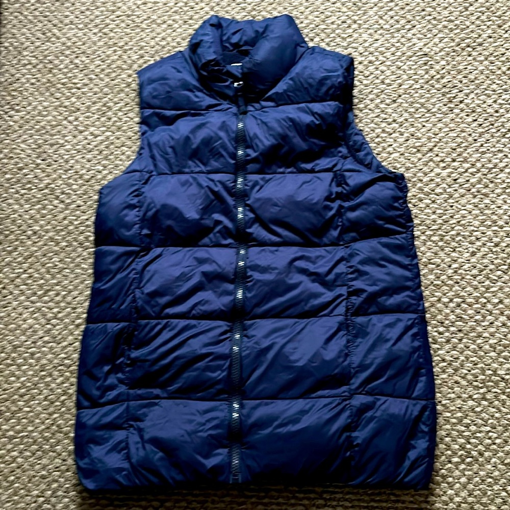 This is for girls or boys size 16 old navy! Puffer vest never been worn NWOT
